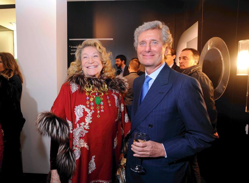 Milano, 2013: Marta Marzotto con Claudio Luti, amministratore delegato di Kartell, al Fuori salone della Settimana del Mobile (Fotogramma)